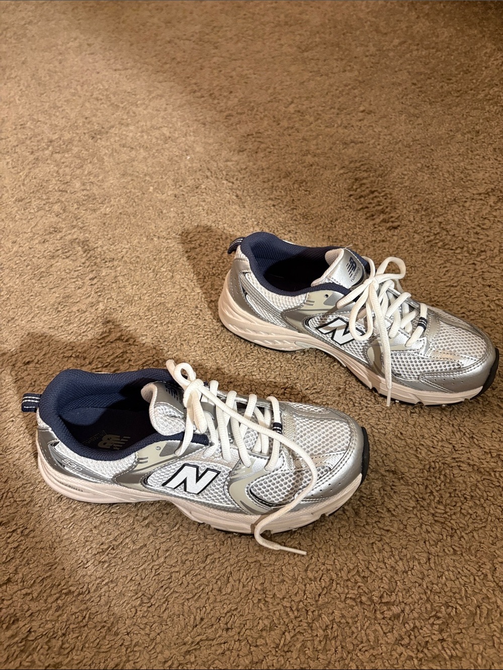New Balance Big Kids 5.5 (women 7 ) Silver and Navy Athletic Sneakers